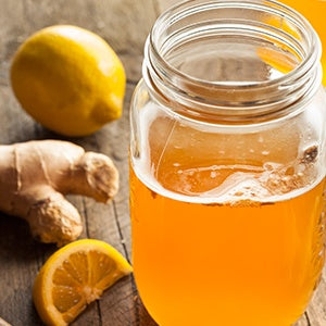 A jar of kombucha. The probiotic Enterococcus faecium helps support gut health.