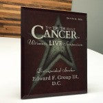 Dr. Edward Group received a Distinguished Presenter award at the Truth About Cancer Symposium.