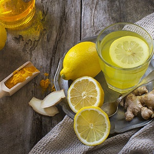 A glass of organic fresh lemonade. Performing a liver cleanse twice a year is a great way to remove the toxins from your liver.