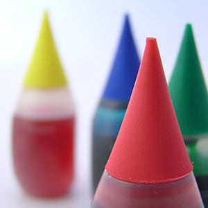 Four bottles of food dye. Studies show that there is a connection between food dyes and ADHD.