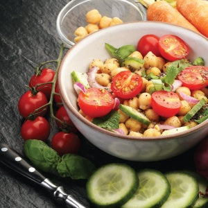 A bowl full of vegetables. Studies show that gardening at home among adults can help with veggie consumption.