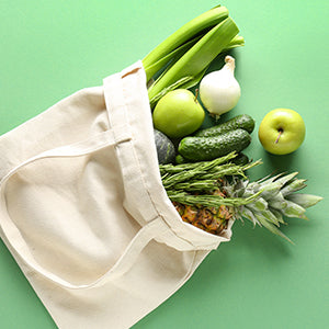 A reusable bag with produce.