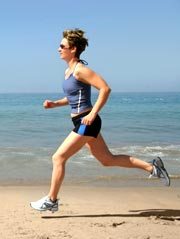 Woman jogging at the beach