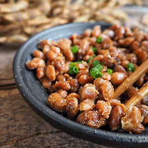 A bowl of natto. Nattokinase is a potent enzyme that helps support heart health.