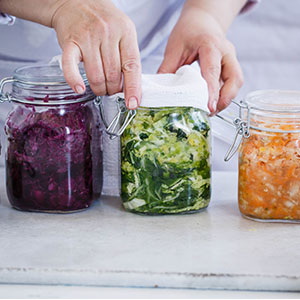 Jars of fermented foods. Studies show probiotics can help support the immune system.