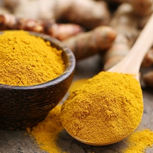 A spoon full of turmeric. Studies show that turmeric can help improve the digestive system.