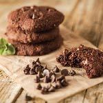 A stack of gluten-free vegan chocolate chip cookies. This recipe is a healthier option to the usual flour-based cookies.