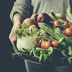 This farmer's basket of fresh, organic vegetables is protected by the Vermont GMO labeling law that goes into effect July 1.